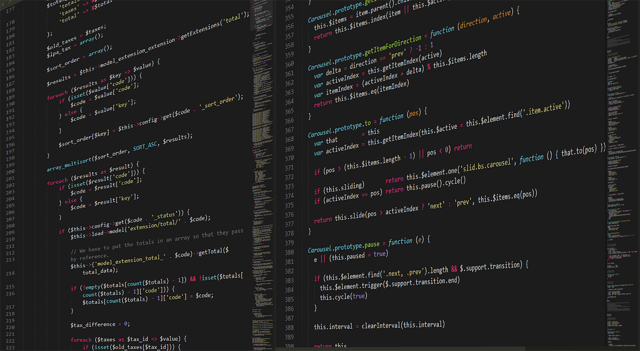 Website code displayed on a monitor
